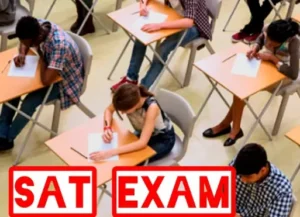 Students studying with books and laptop for SAT syllabus preparation